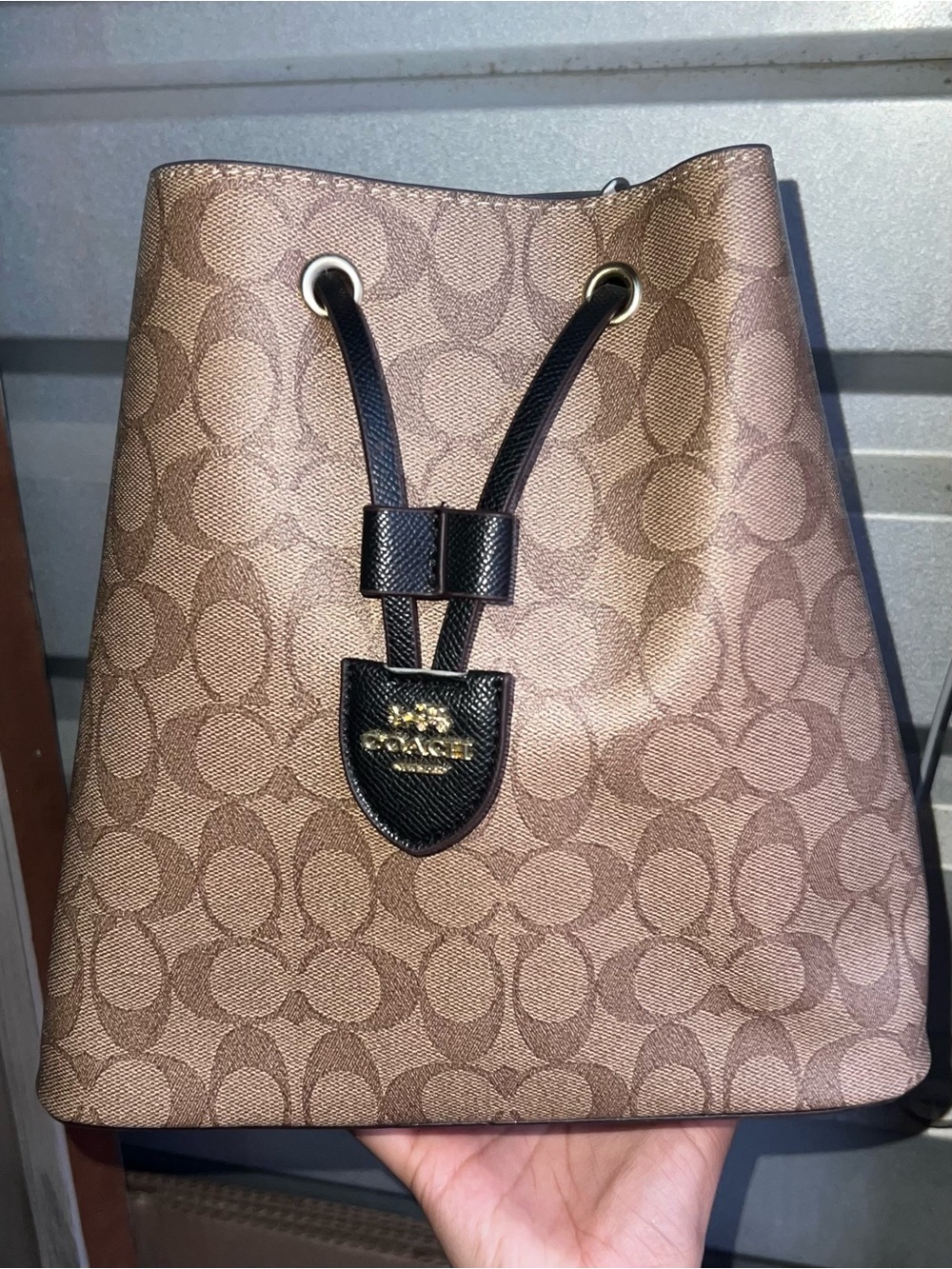 Coach Brown Signature Canvas Drawstring Bucket Bag with Black Trim